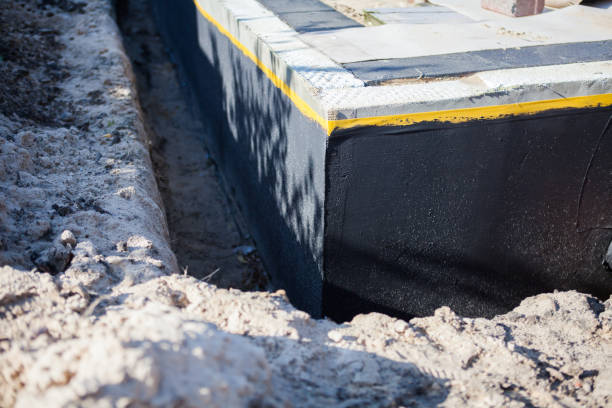 Professional Emergency Waterproofing technician working in Allenton, WI